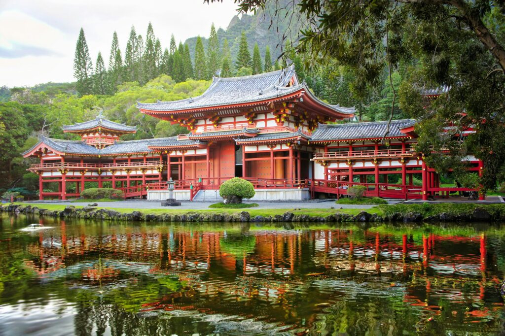 The Byodo-In Temple, a serene Japanese temple set against lush mountains in O‘ahu.