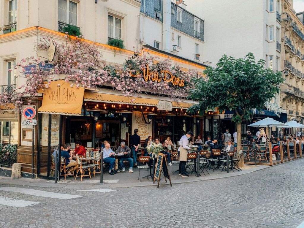 “Morning café culture in Paris, where lingering over coffee is part of daily life.”